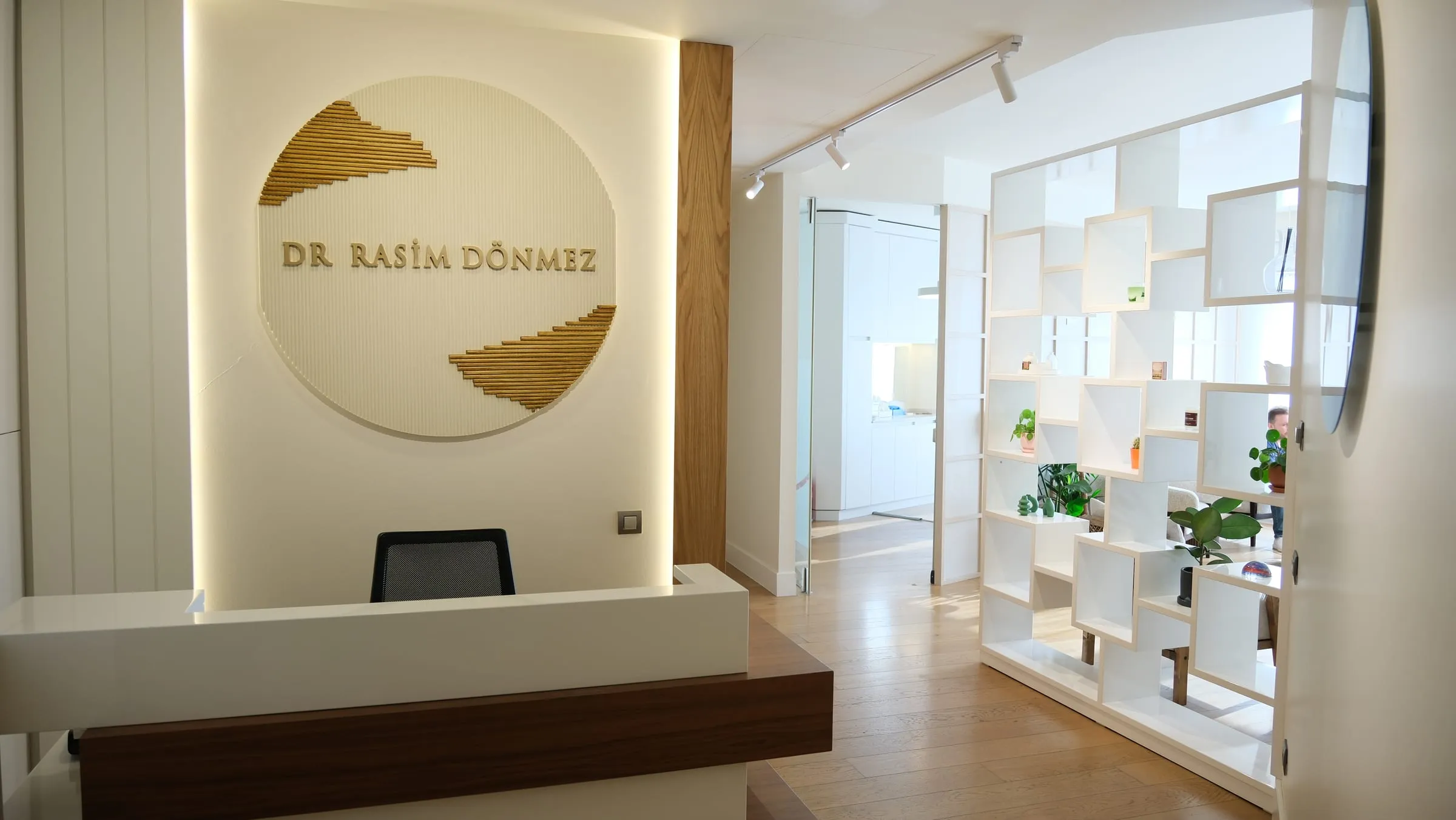 The clinic reception area with the Dr. Rasim Dönmez sign on the wall